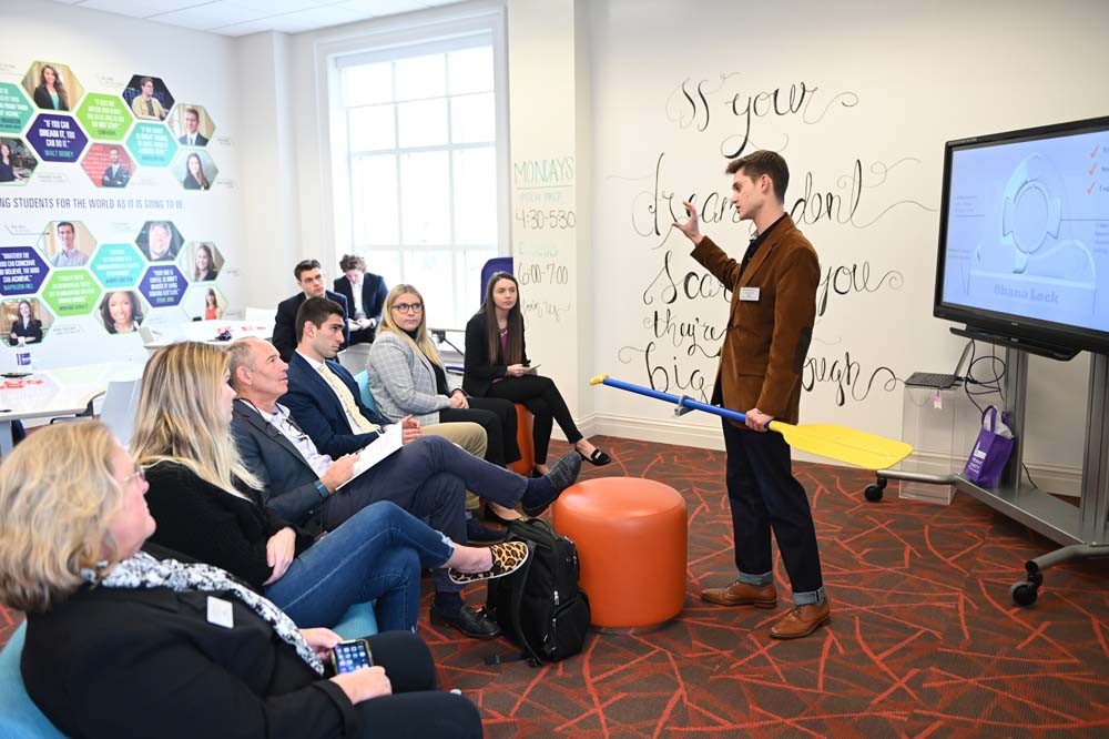 Students in High Point University’s Entrepreneurship Club pitched their business ideas to Randolph inside Cottrell Hall’s Graves Collaboratorium and Belk Center for Entrepreneurship. 