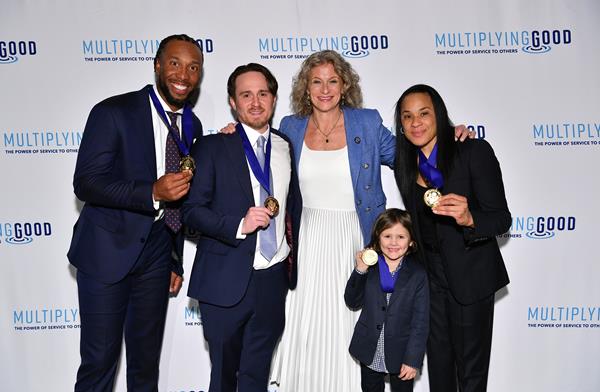 Jefferson Award recipients NFL player Larry Fitzgerald, NYC social worker J.C. Hall LMSW, Multiplying Good CEO Hillary Schafer, 6-year-old Owen Colley, and USC Head Coach Dawn Staley pose at the 2020 NYC Jefferson Awards at Capitale 