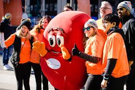 Konica Minolta employees pose with Sidney the Kidney during The National Kidney Foundation’s 2018 NYC Kidney Walk.
