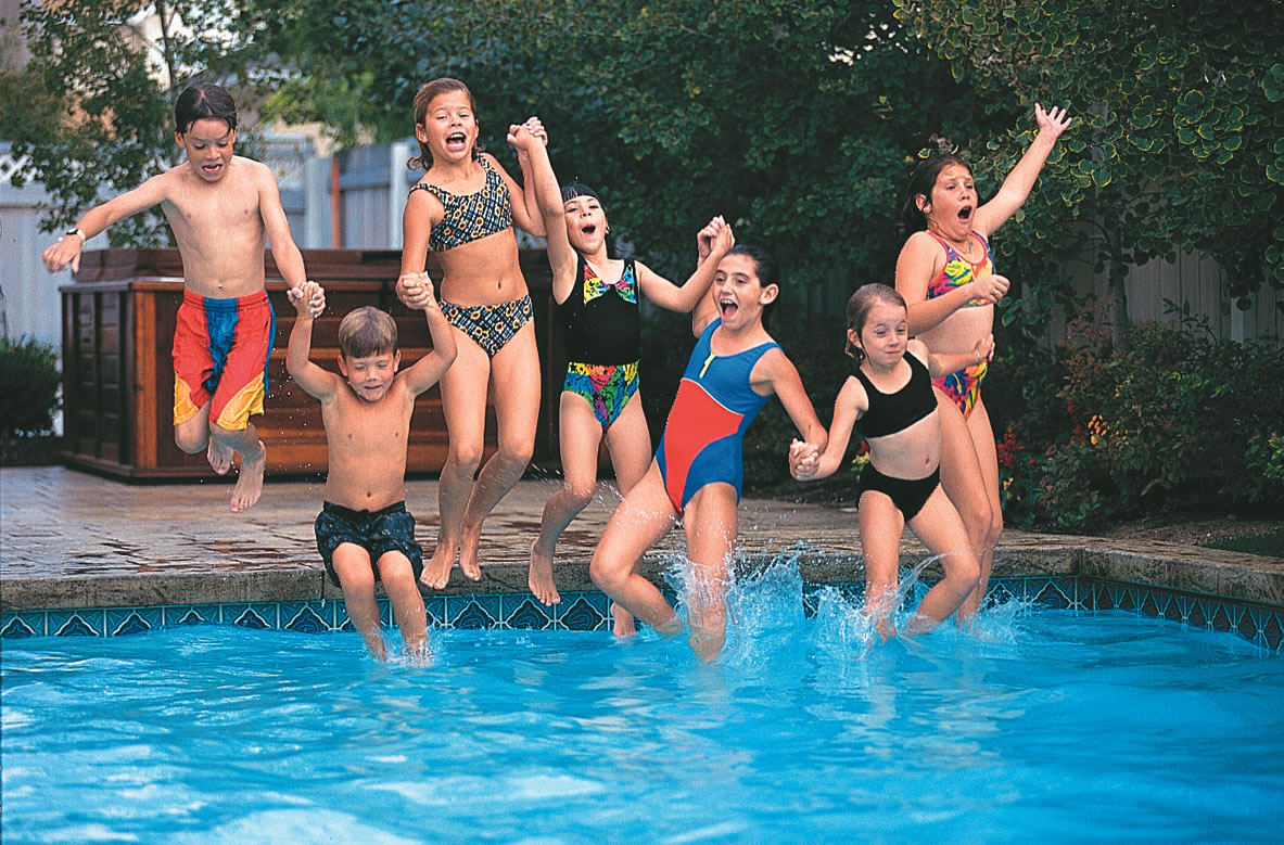 Kids jumping in pool
