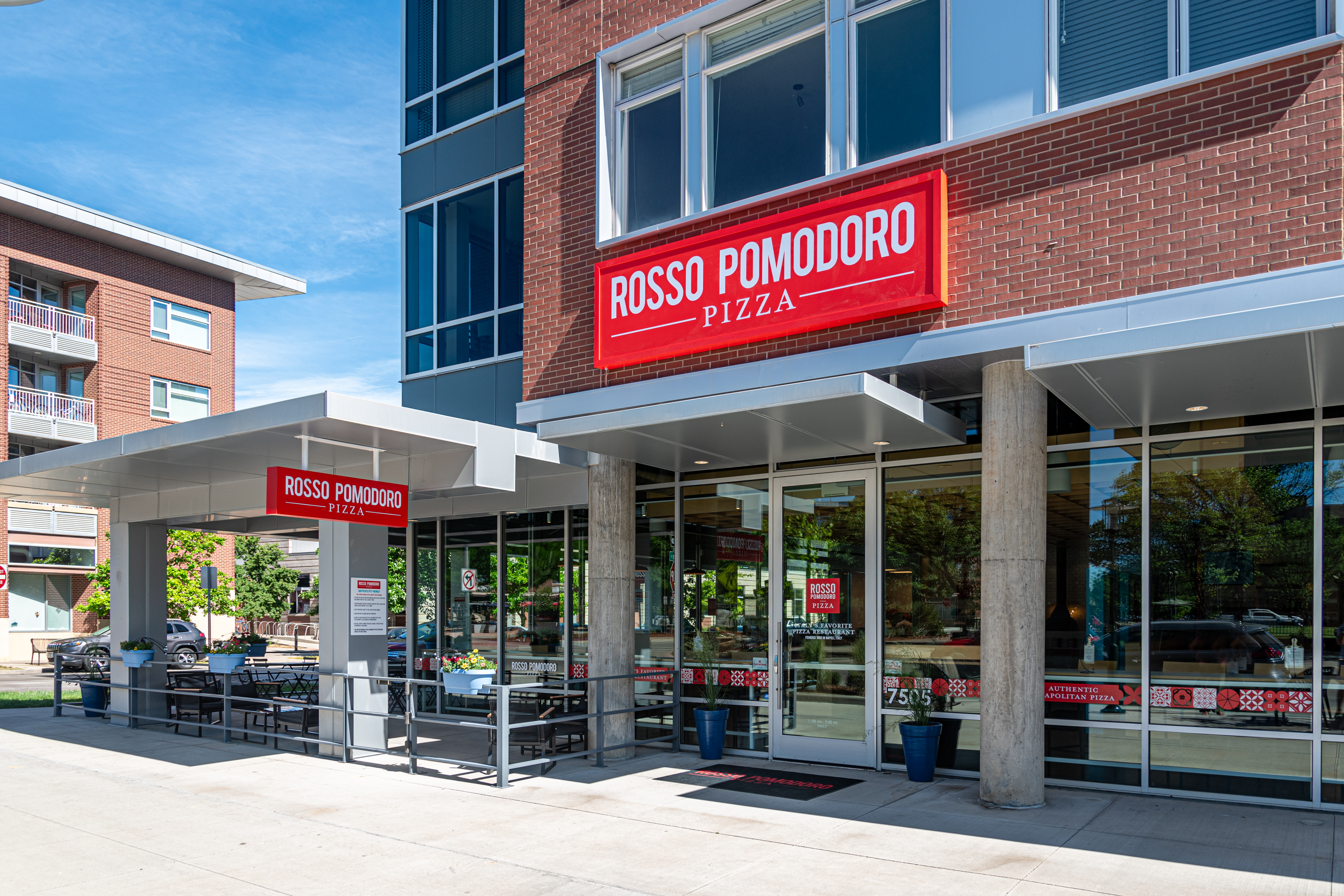 Image shows the exterior of the new Rosso Pomodoro Neapolitan Pizza Restaurant in Denver Colorado