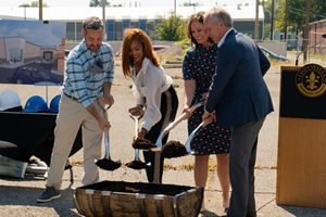 From left to right: Flavorman COO, Scott Weddle; Legislative Aide for the Office of Metro Council President David James, Shalanna Taylor; Lt. Governor of Kentucky, Jacqueline Coleman; and Louisville Mayor Greg Fischer break ground on the site of Flavorman's upcoming facility.