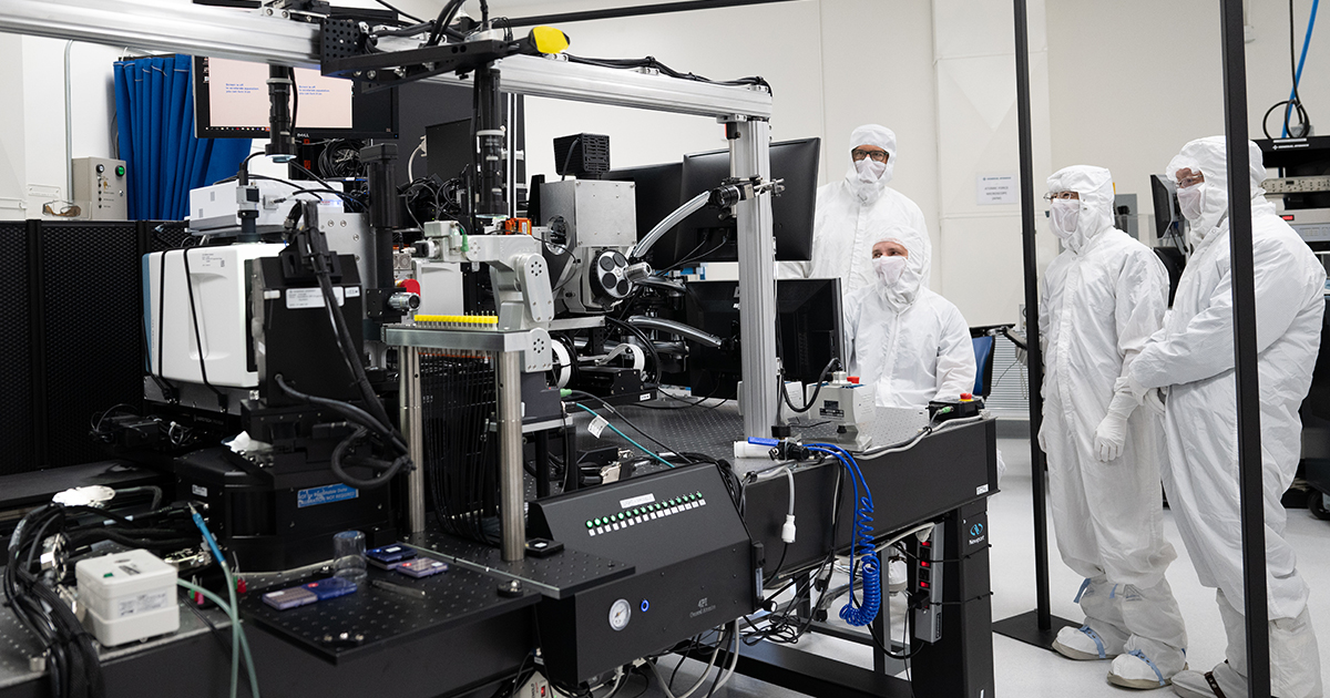 Members of the Metrology Research and Development team working with the 4Pi system in a clean room at General Atomics headquarters. Credit: General Atomics