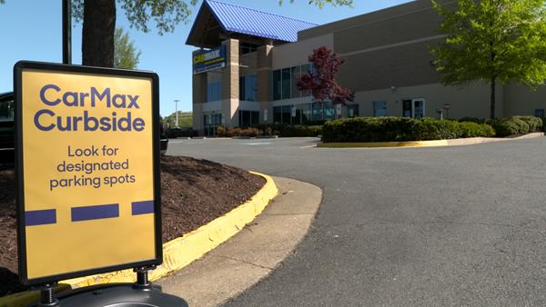 CarMax launches contactless curbside pickup. 
