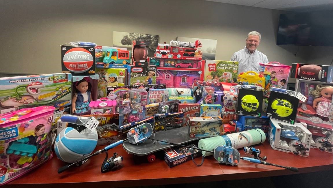 Ugly sweater "mistake" turns into Toys for Tots donation.