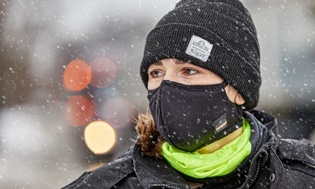 Worker wearing face-covering in the cold weather