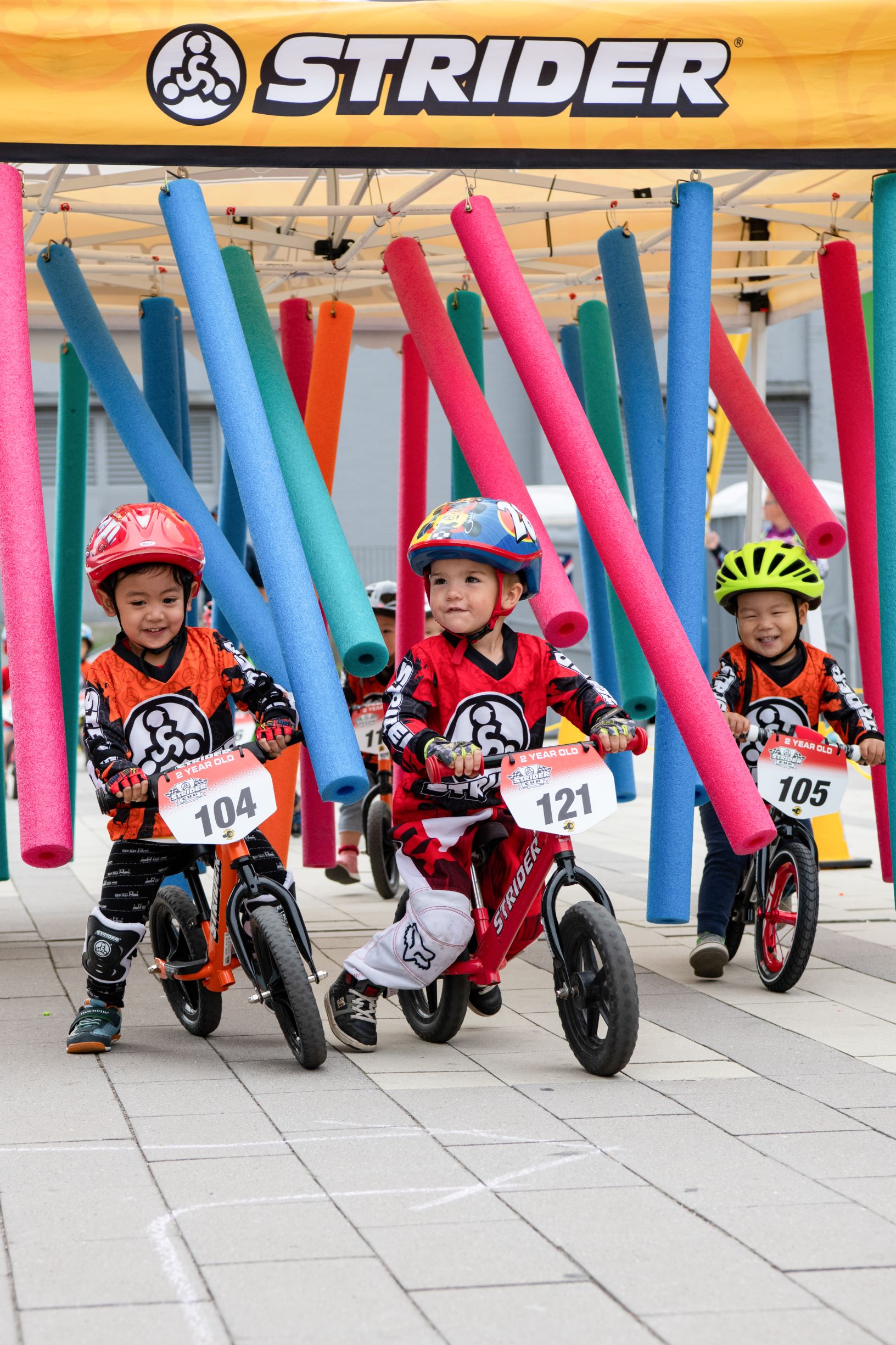 Racers blast through the Noodle Monster at the Aug 17, 2019 Strider Cup in Surrey, Canada.