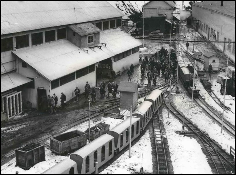 Office building in the process of being demolished shown in its historical context (L).  An auger-cast pile rig operated by LFI (R)