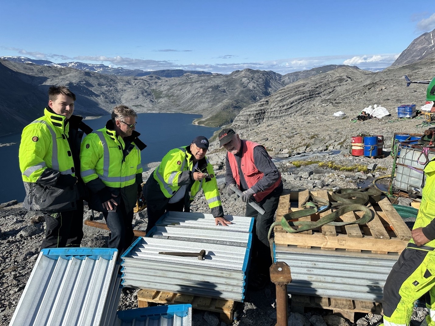 Company Geologists Dr Hans Christian, George Karageorge, Nick Barnes DFS Study Team Representative Kris Barnes inspecting drill core on drill pad K25-01. 