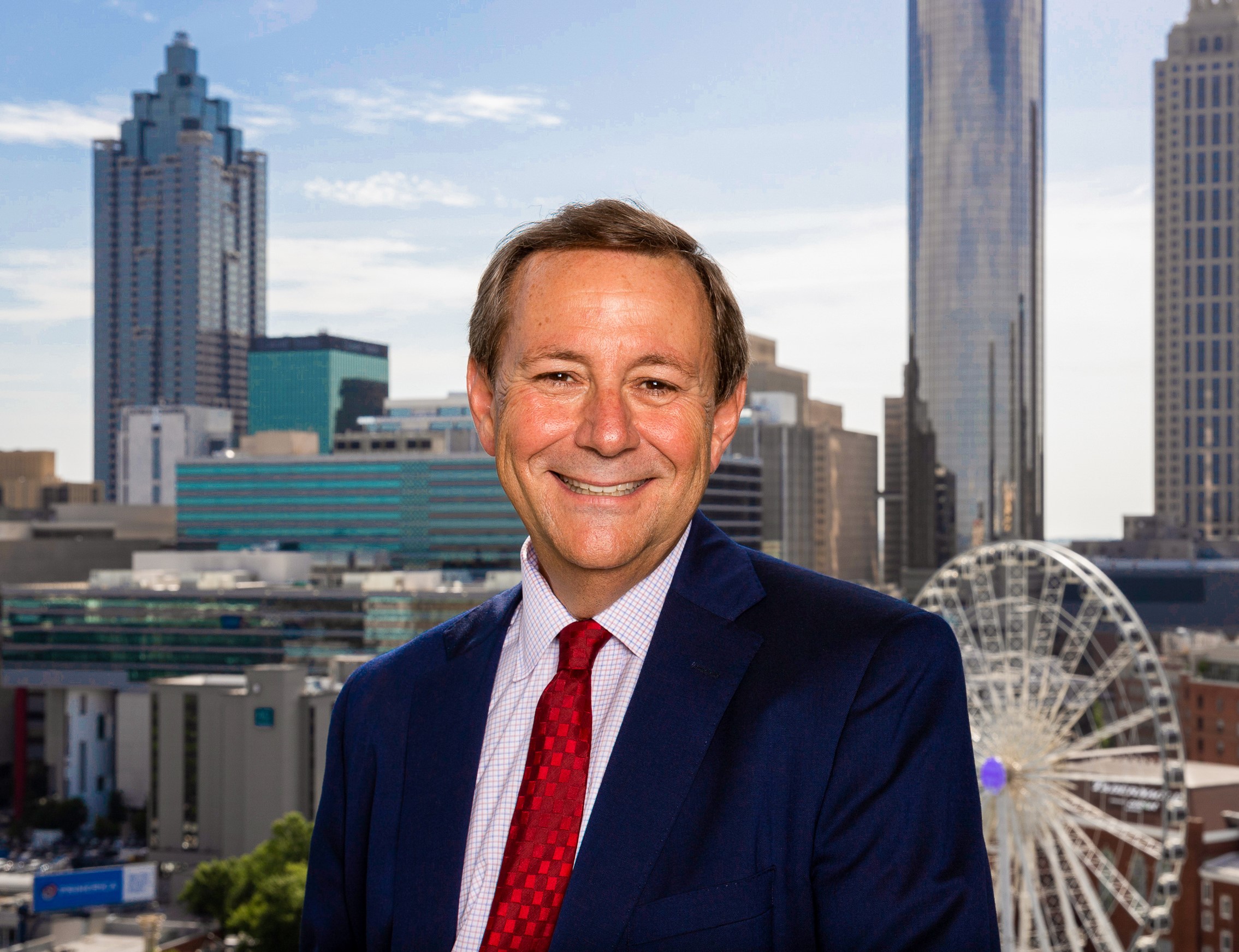 William Pate with Atlanta skyline