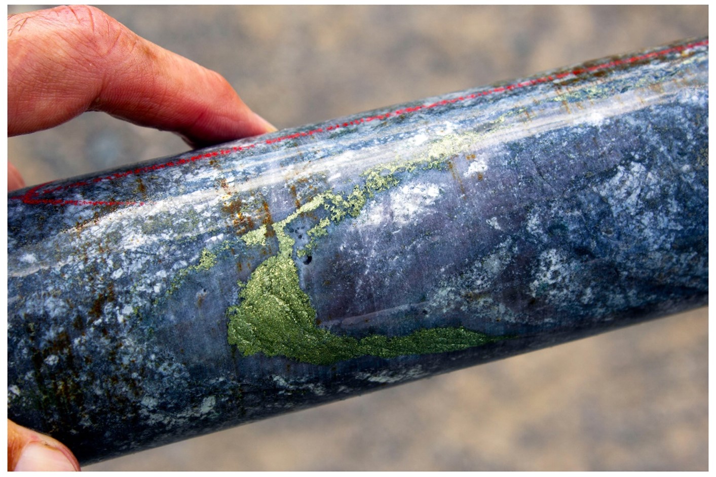 Figure 2 - Hole KTDD0018, at c. 845m. Quartz-chalcopyrite vein amid biotite-Kspar alteration