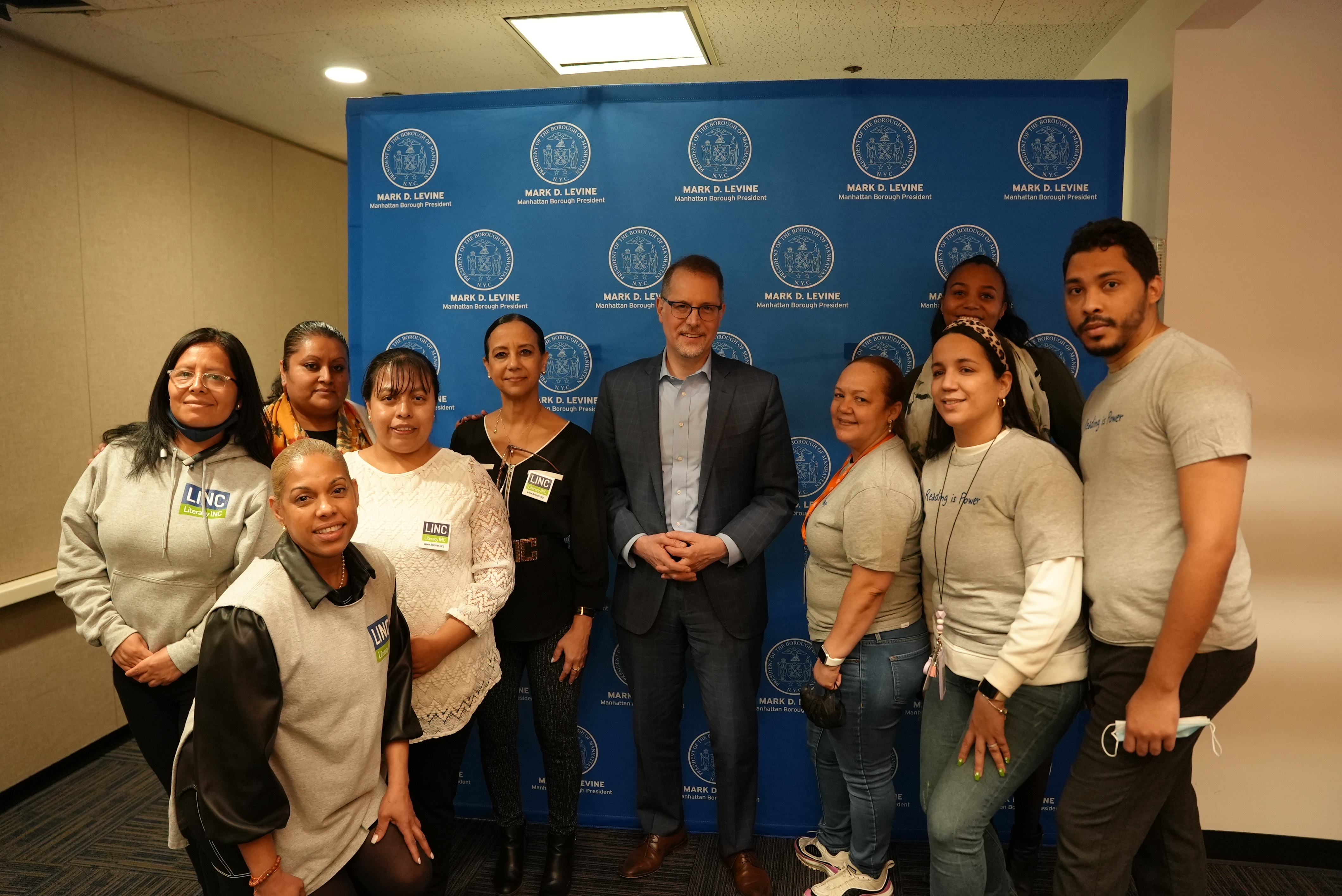 Photo of Cayuga Centers staff, Literacy Inc staff, and Manhattan Borough President Mark Levine