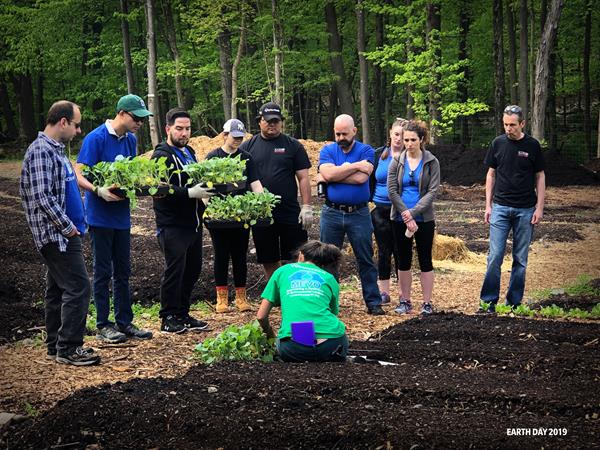 April 22, 2019 – Mahwah, NJ – A team of Konica Minolta employees on Earth Day 2019 at the Mahwah Environmental Volunteers Organization (MEVO). Volunteers assisted with projects such as planting, weeding and mulching to help us accomplish our mission to create a more ecologically sustainable future.