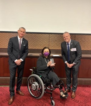 U.S. Senator Tammy Duckworth (D-IL) accepts the 2025 Sentinel Award presented by WPRC Board Chairman Markin Dornan and Executive Director David Costello