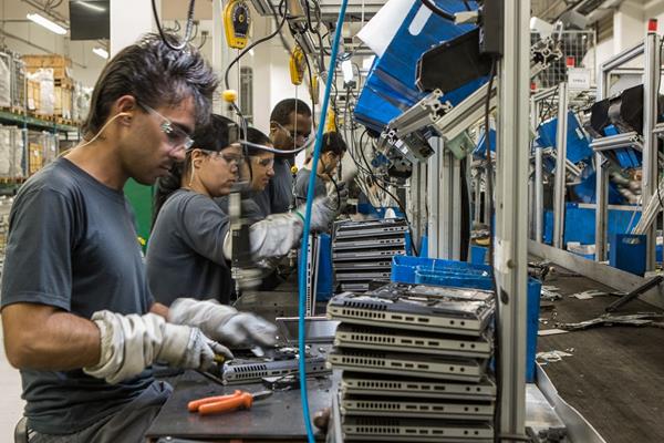 HP workers disassemble and refurbish hardware in Brazil.
