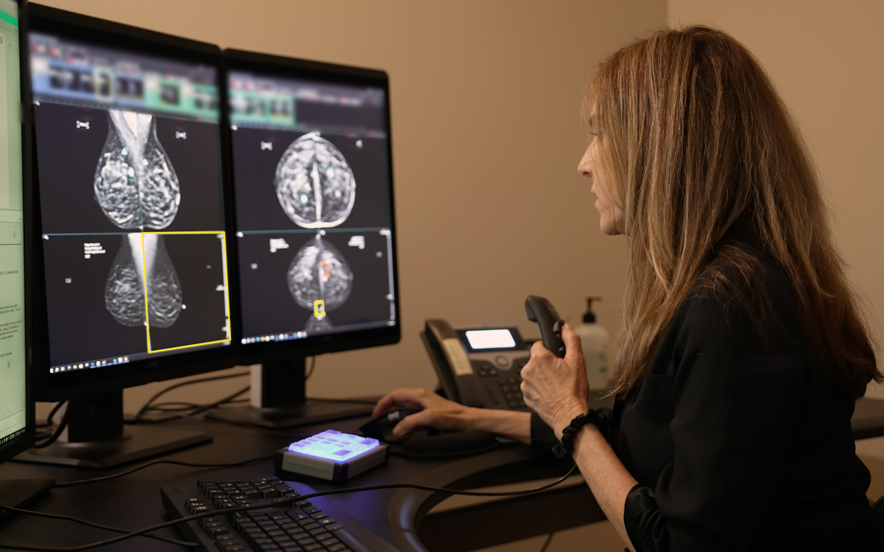 Radiologist reading mammogram with DeepHealth's Breast Suite 