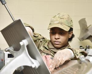 Airman 1st Class Shyla Hudson, services specialist, 127th Force Support Squadron, prepares Thanksgiving style menu for members of the 127th Wing at the dining facility at Selfridge Air National Guard Base, Michigan, Nov. 5, 2022. This year, Defense Logistics Agency Troop Support sent more than 41,000 370,000 pounds of beef and about 24,000 pounds of ham to our military service men and women stationed around the world to enjoy during their traditional Thanksgiving meal.  (U.S. Air National Guard photo by Tech. Sgt. Samara Taylor)