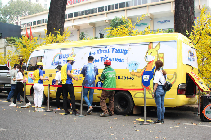 Bus goes around HCM City supplying free face masks