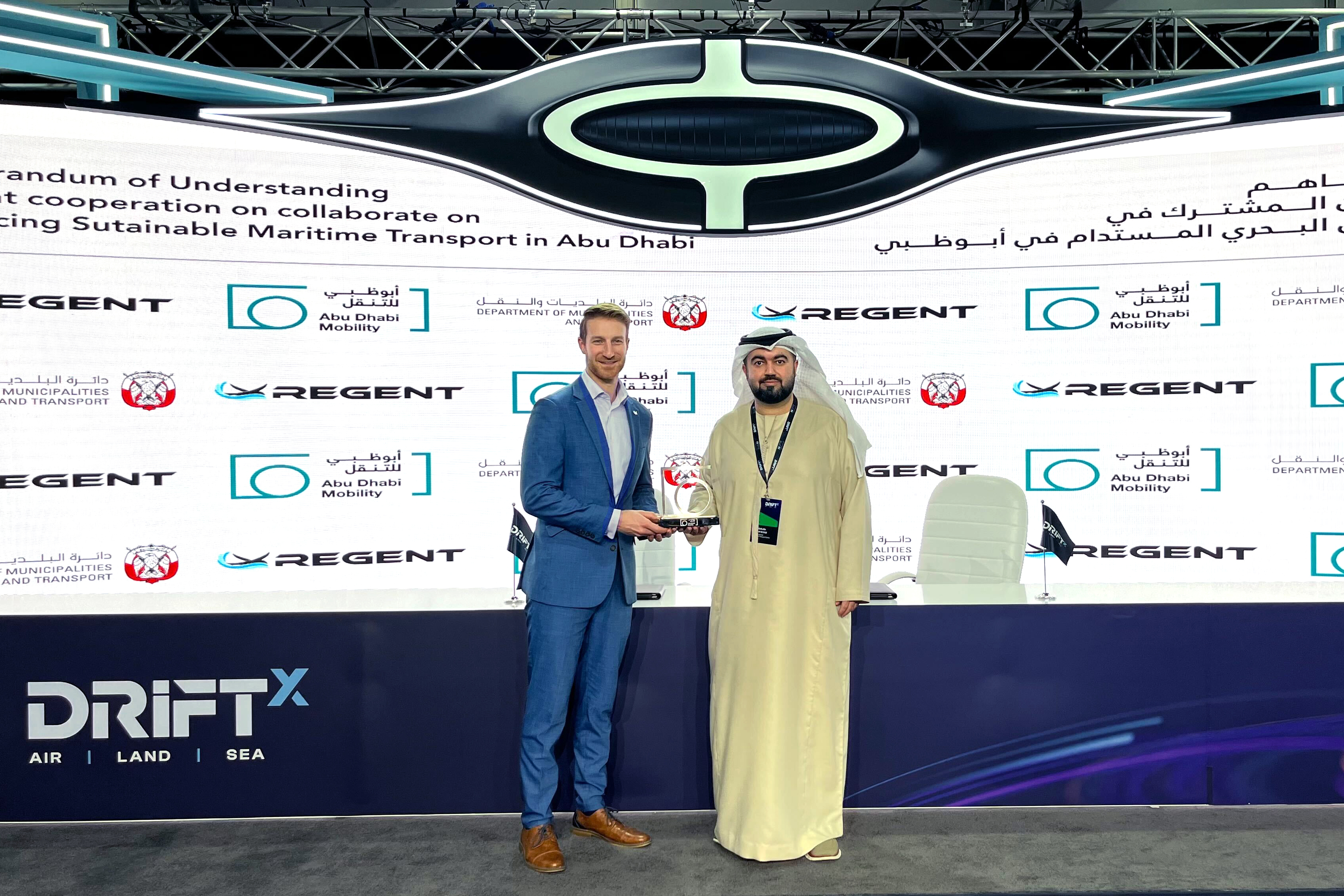 REGENT Co-Founder and CEO Billy Thalheimer (left) signs an MOU with the Abu Dhabi Department of Transportation today at DriftX in Abu Dhabi.