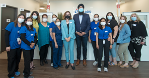 The Honourable Prabmeet Singh Sarkaria, MPP Candidate for Brampton South, Erica Zarkovich, Senior Vice President, Government Markets for LifeLabs, and LifeLabs patient service centre employees mark the grand opening of LifeLabs’ newest Patient Service Centre in Brampton, Ontario.