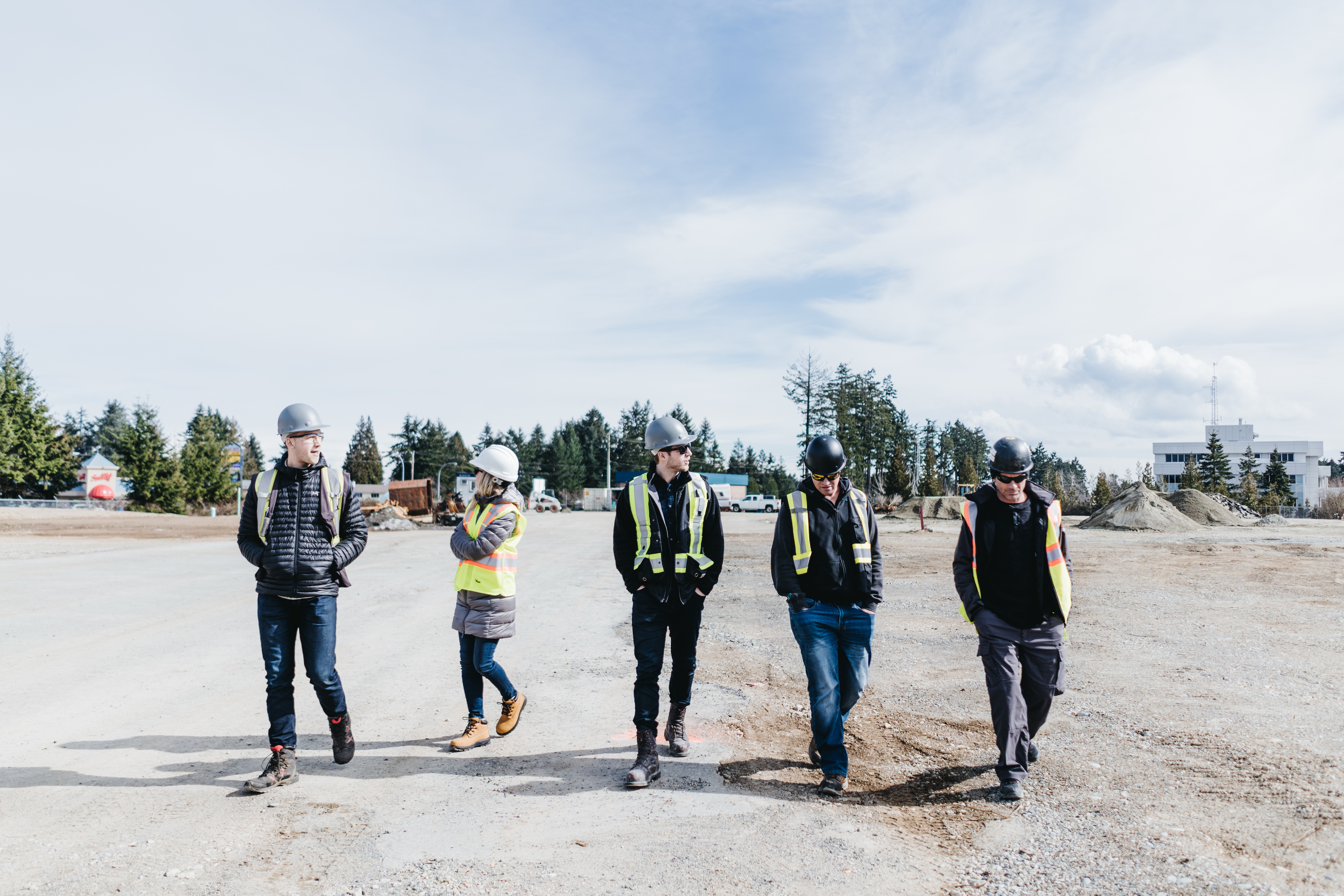 SitePartners team tours a client project site. 