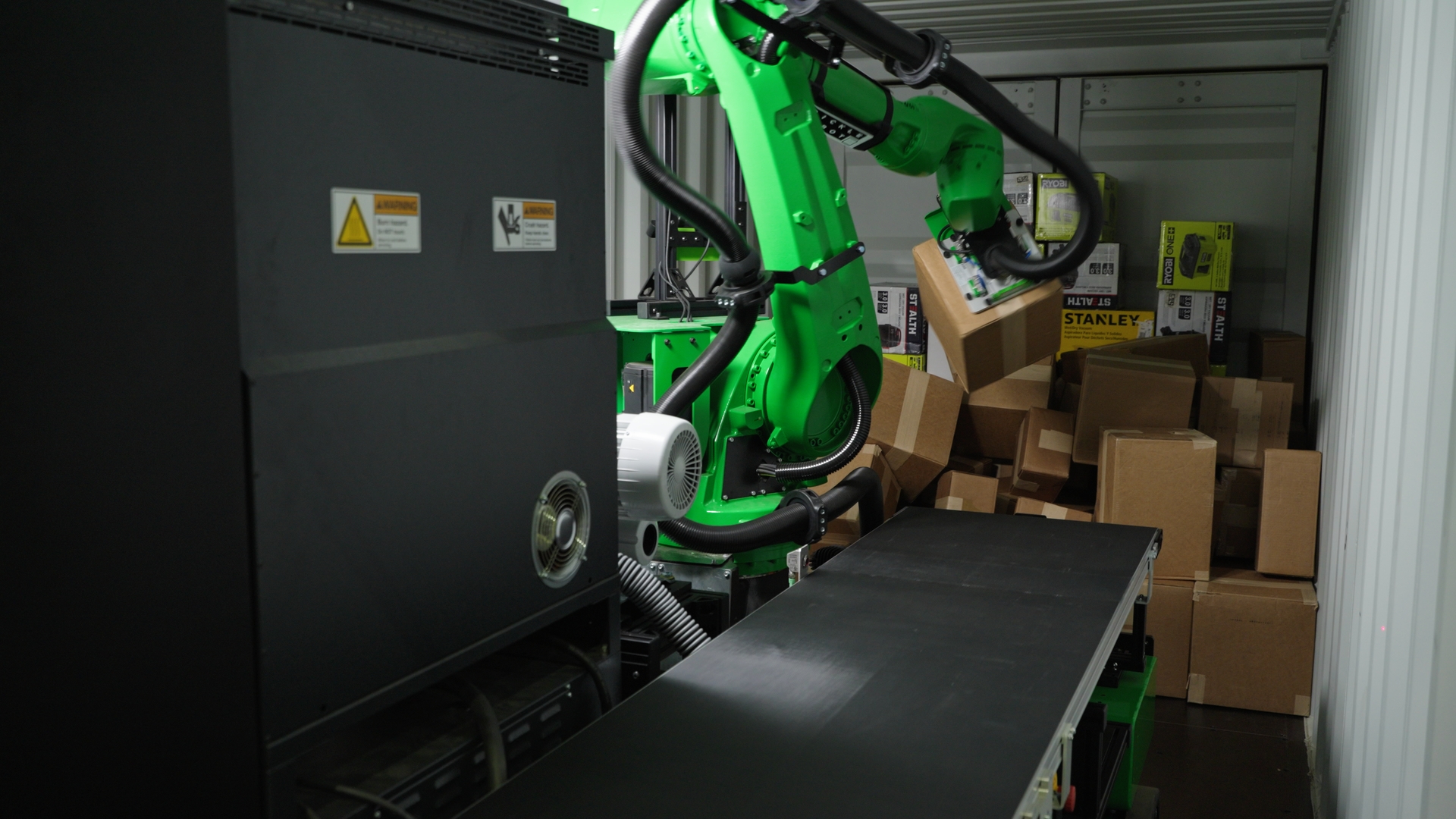 Pickle Robot Unloading a Messy Trailer