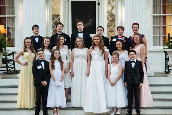 A group of Junior Cotillion students with their Director prior to the Grand Spring Ball. 