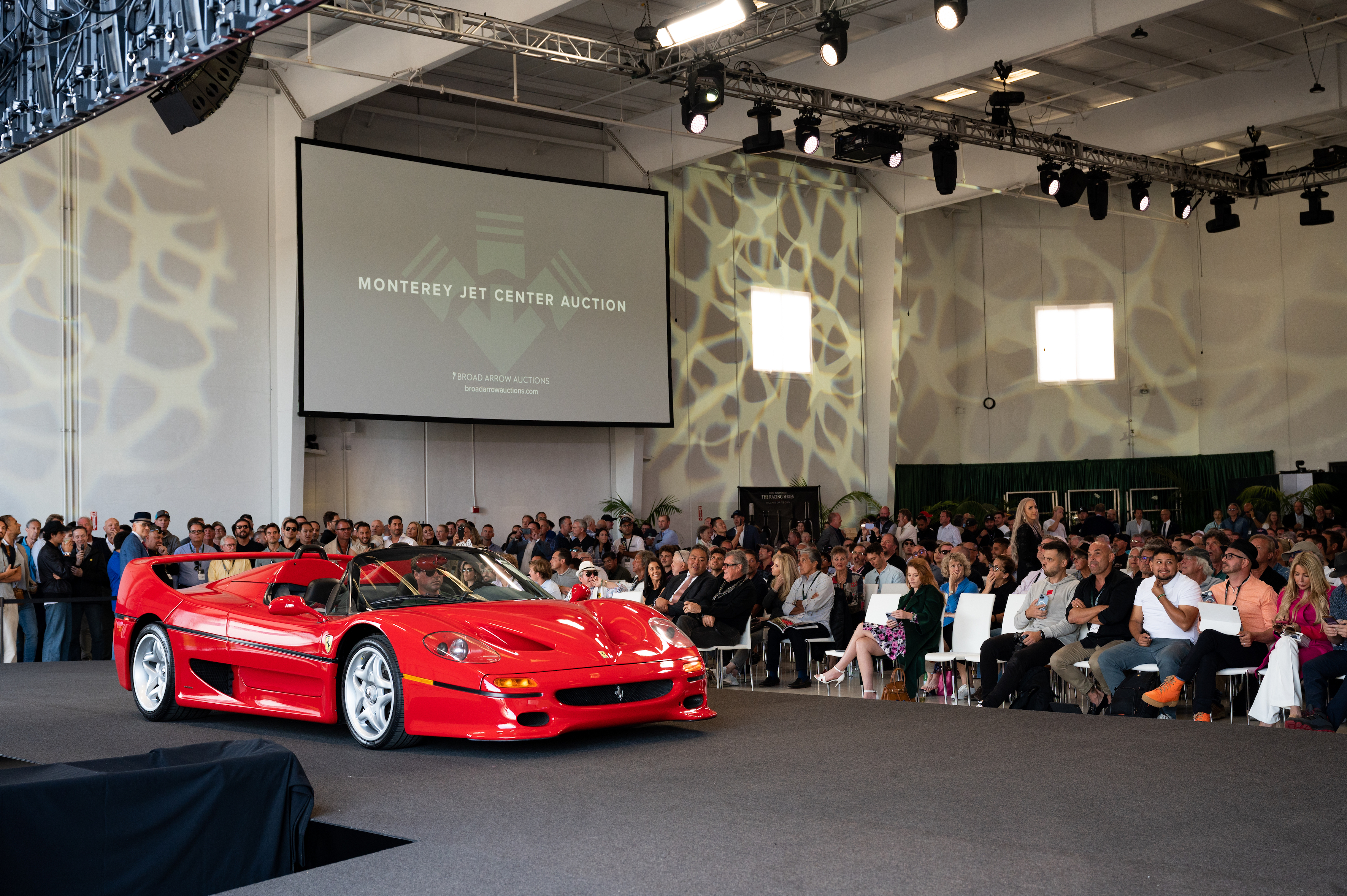 1995 Ferrari F50 crosses the podium at Broad Arrow Auctions' debut Monterey Jet Center Sale