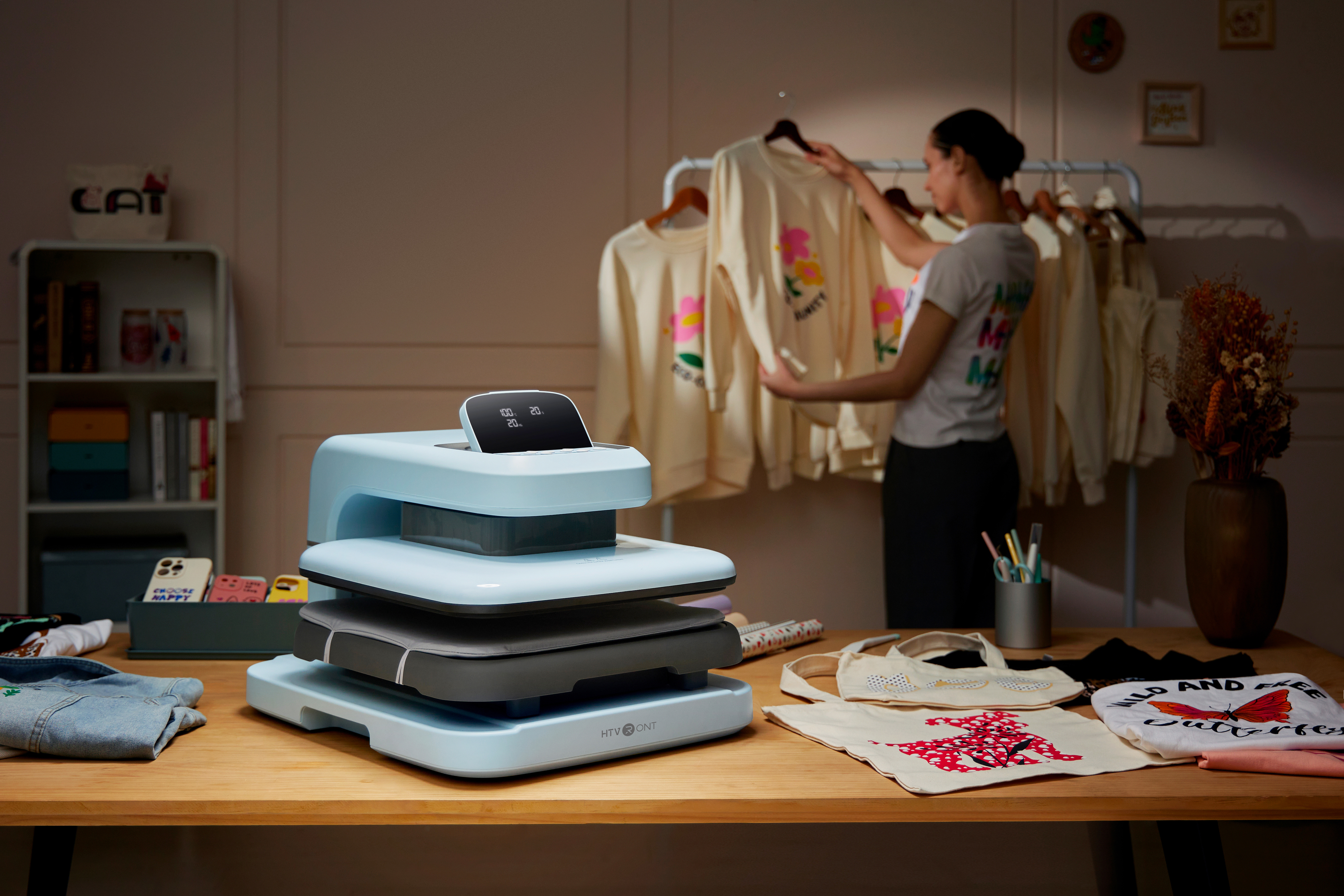 Family crafting custom T-shirts and holiday items with the HTVRONT Auto Heat Press 2