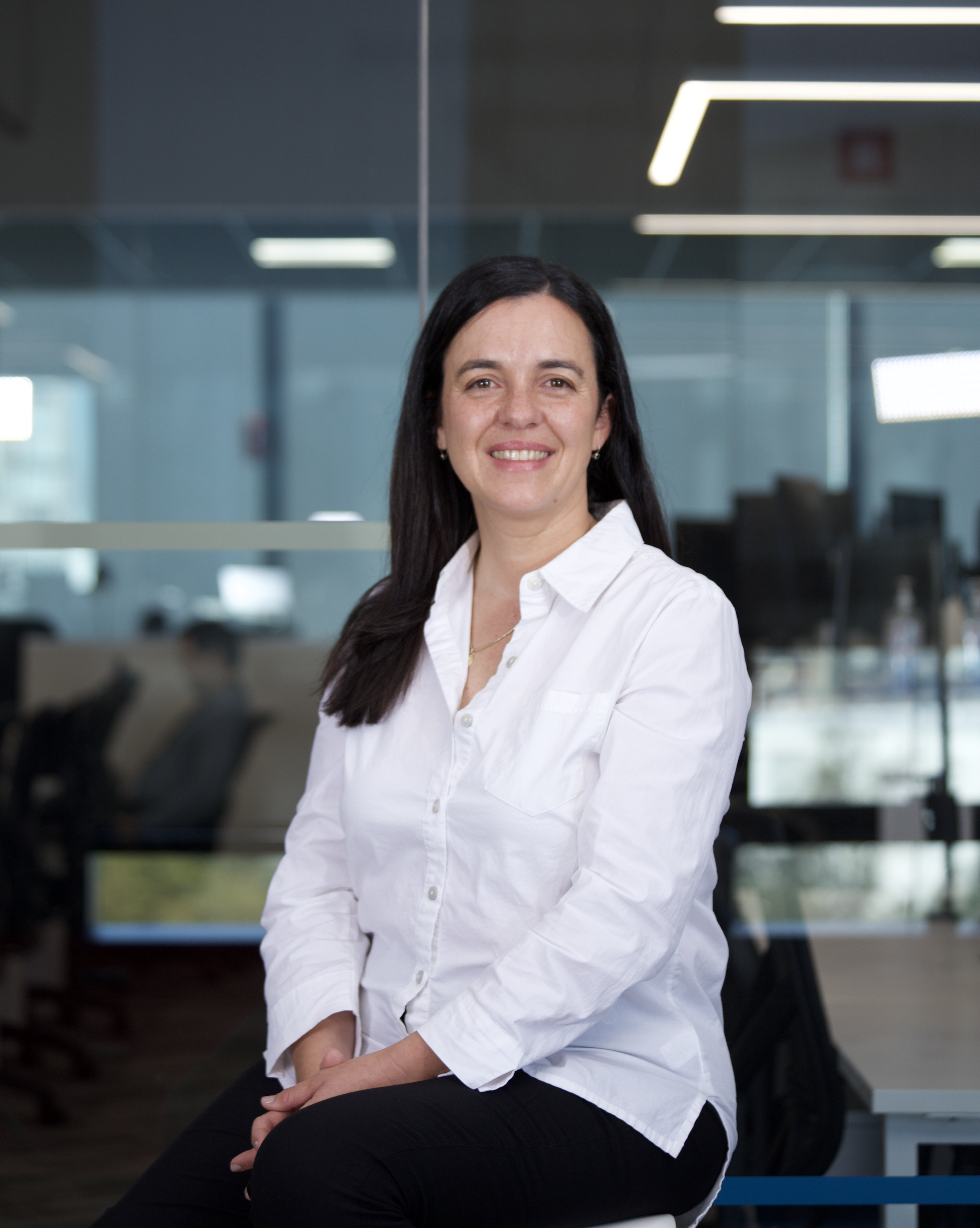 Ines Casares, Wizeline’s new CEO, smiling in a professional office setting.
