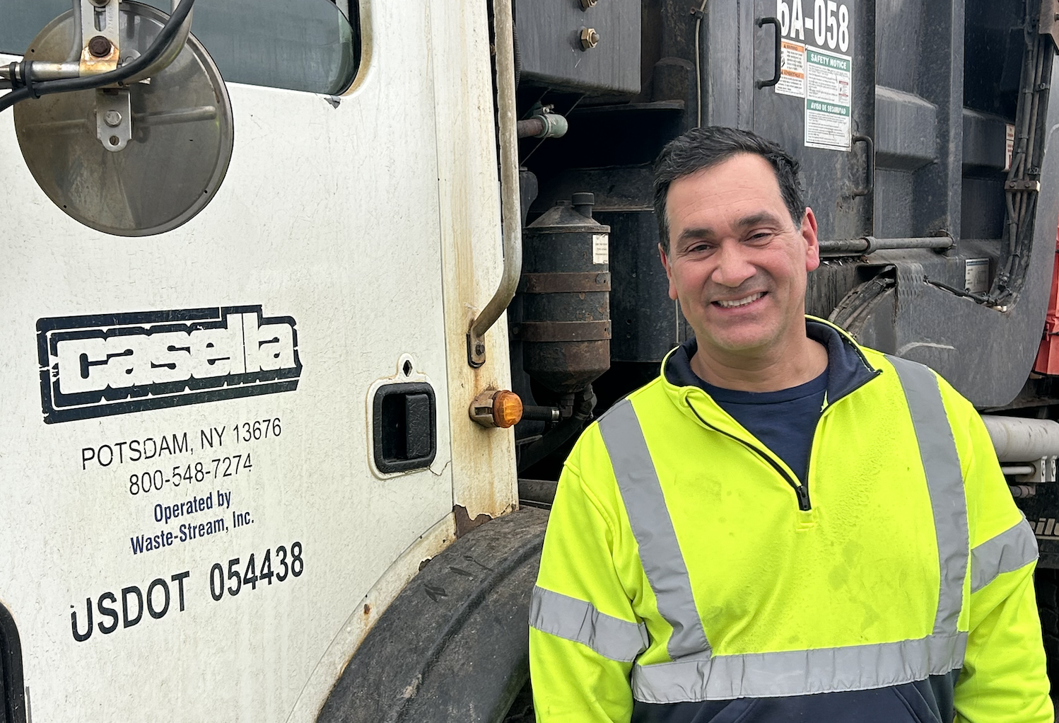 Juan Caraballo in front of his truck