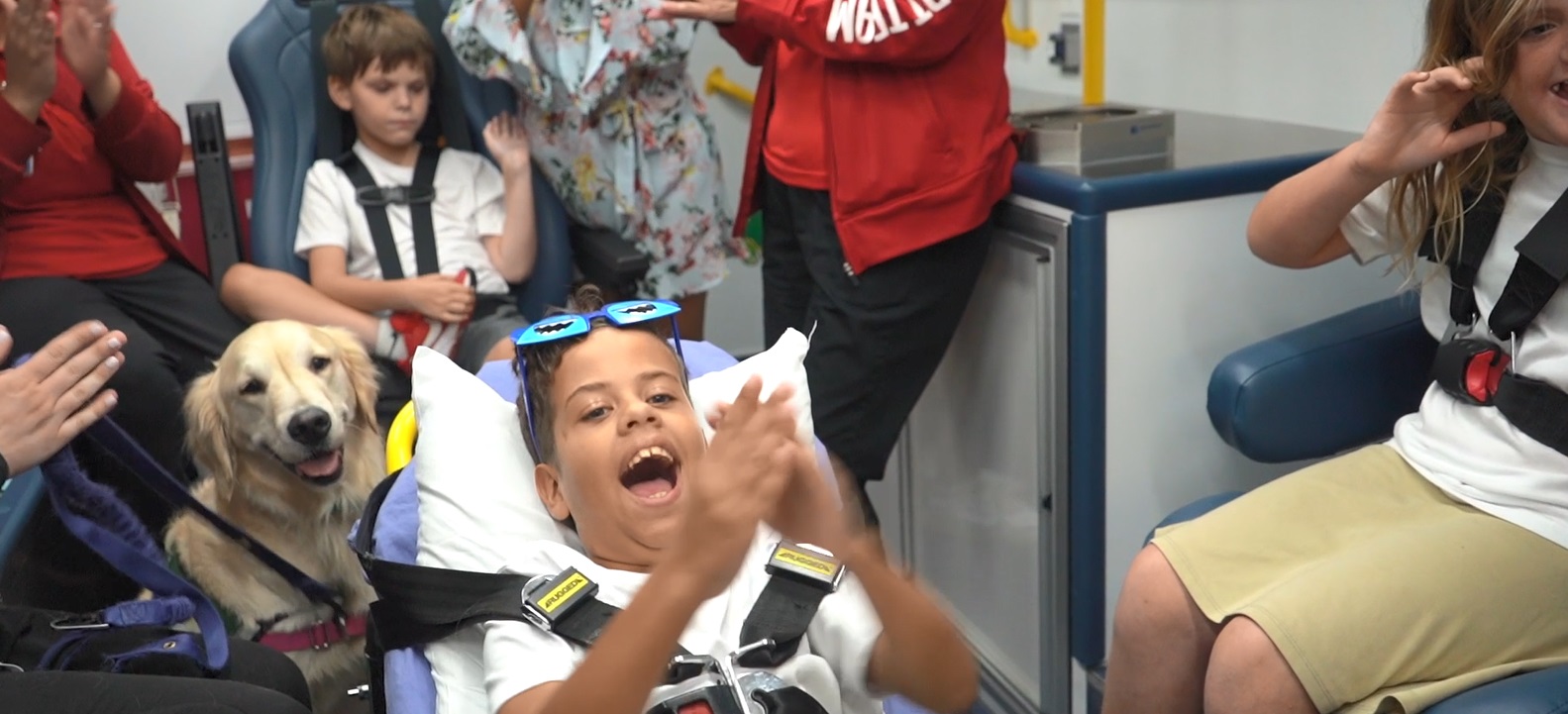 Children at Golisano Children's Hospital of Southwest Florida testing out new ambulance