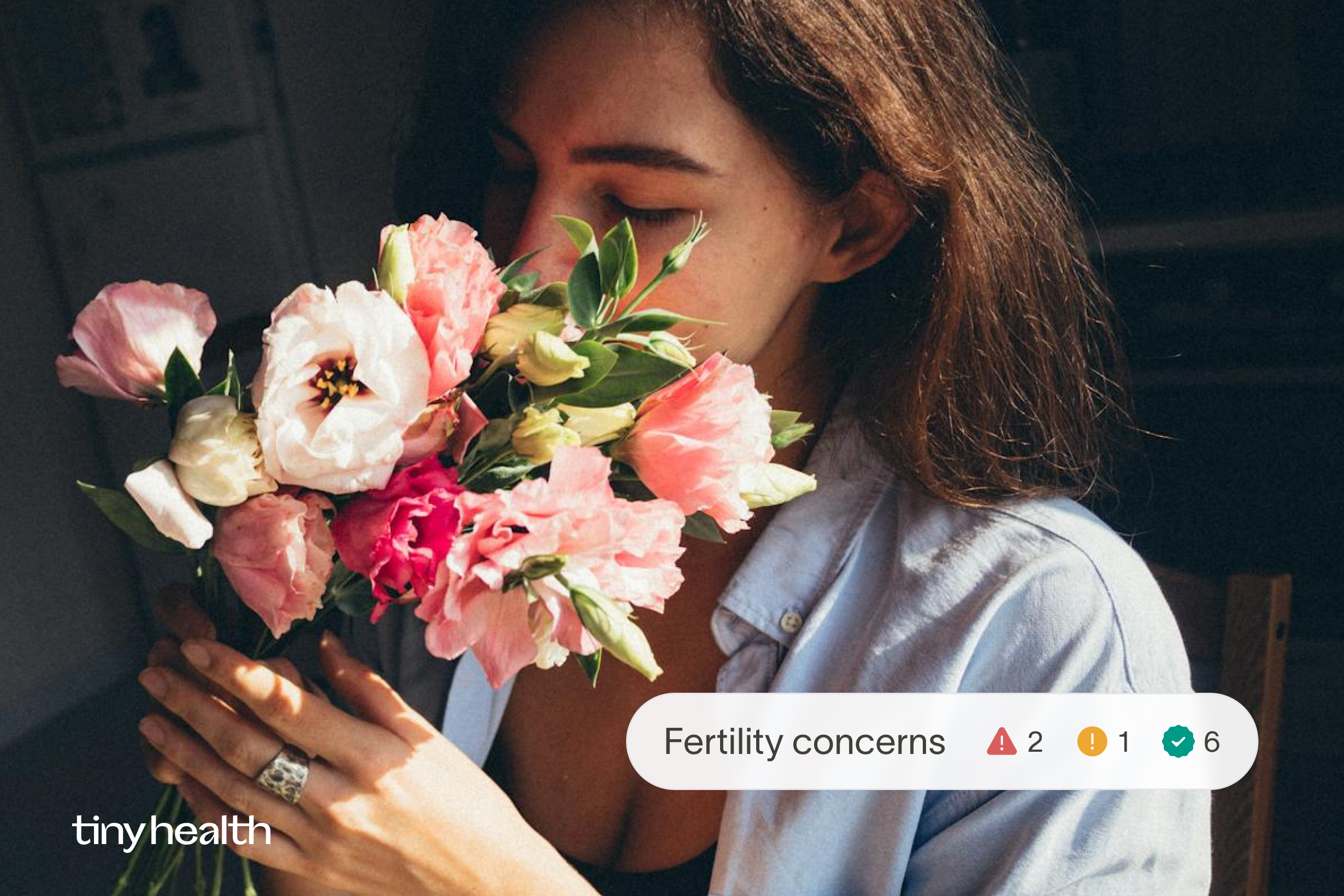 A woman holds flowers. A graphic overlay illustrates a Fertility concerns condition association with flagged metrics, and Tiny Health logo