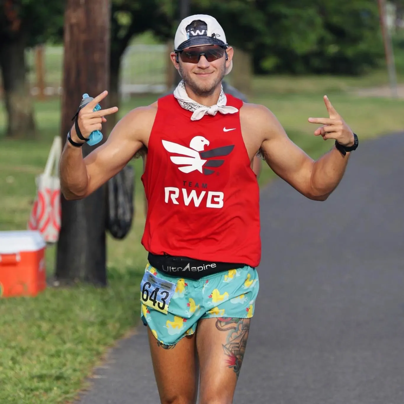 Paul Johnson running while wearing a Team Red, White & Blue (Team RWB) shirt.