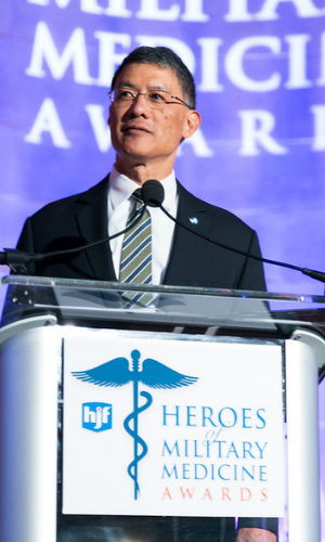 HJF President and CEO Dr. Joseph Caravalho delivering an address at the 2018 Heroes of Military Medicine Dinner. 