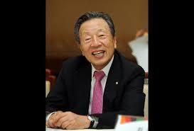 Chang-Woo Han, the successful entertainment empire owner in Japan, who is estimated to be worth $2.6 billion. 