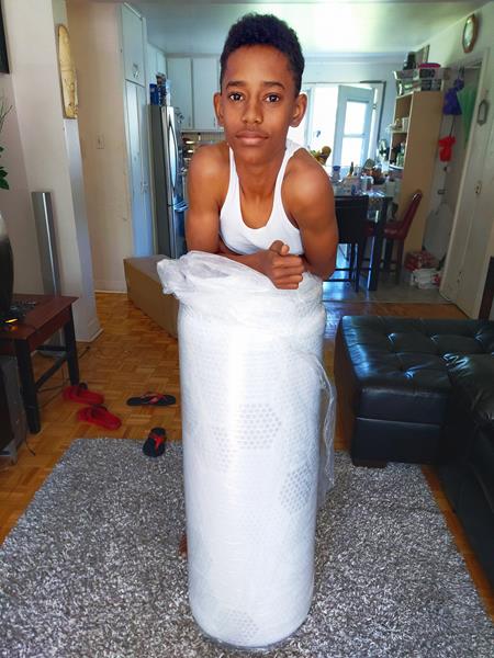 Wish kid Nicolas receives a new mattress from GoodMorning.com as part of a national partnership with Make-A-Wish® Canada