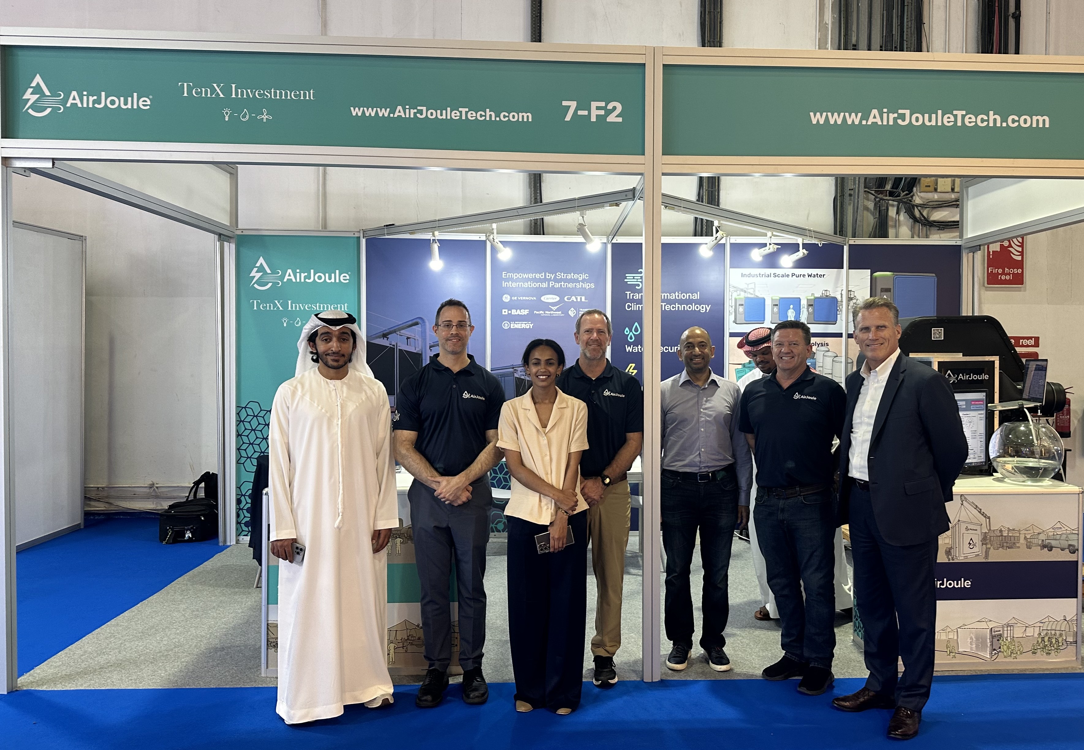 Wetex - Group Photo in front of booth - Hi Res