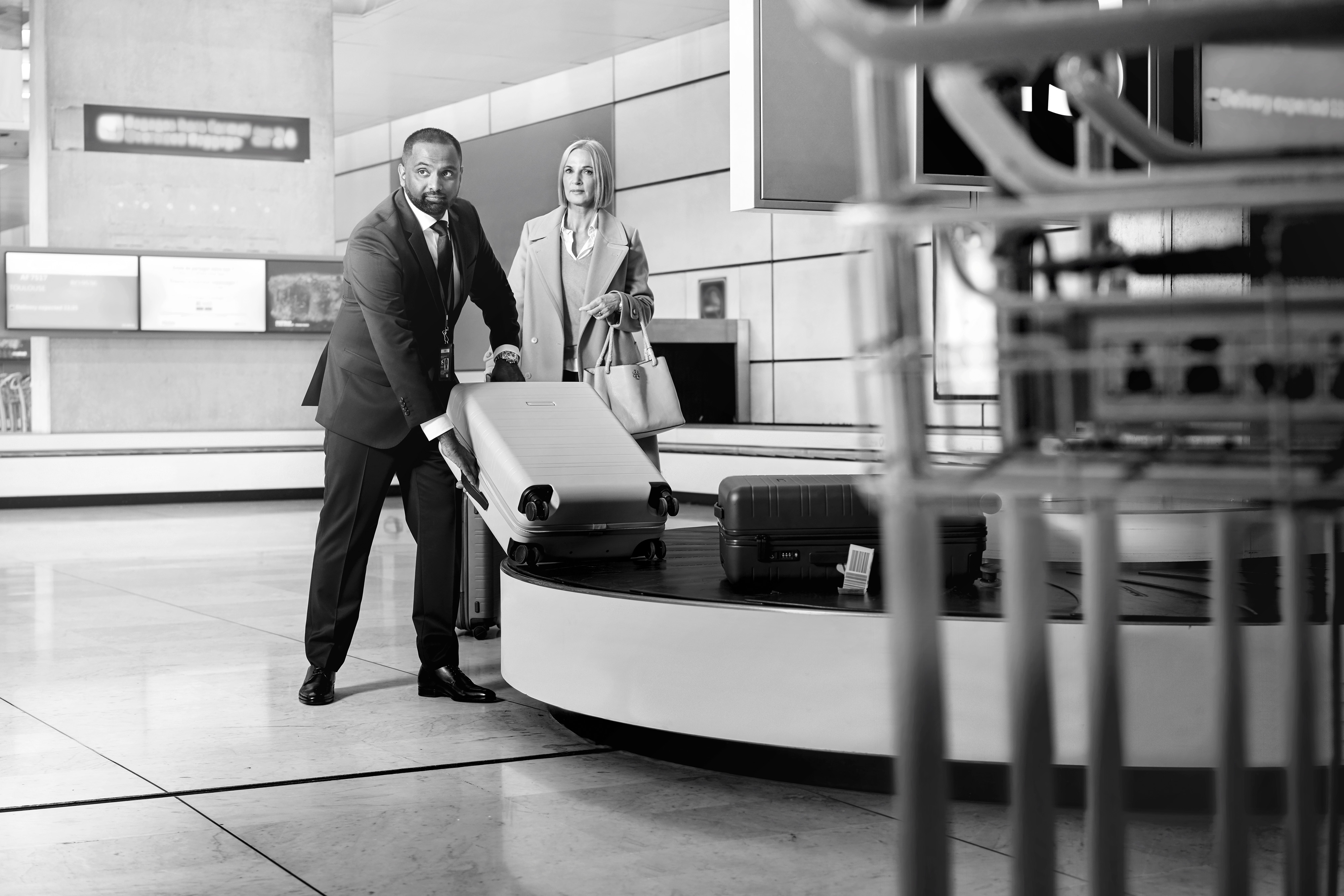 Blacklane guest collecting luggage before exiting the airport