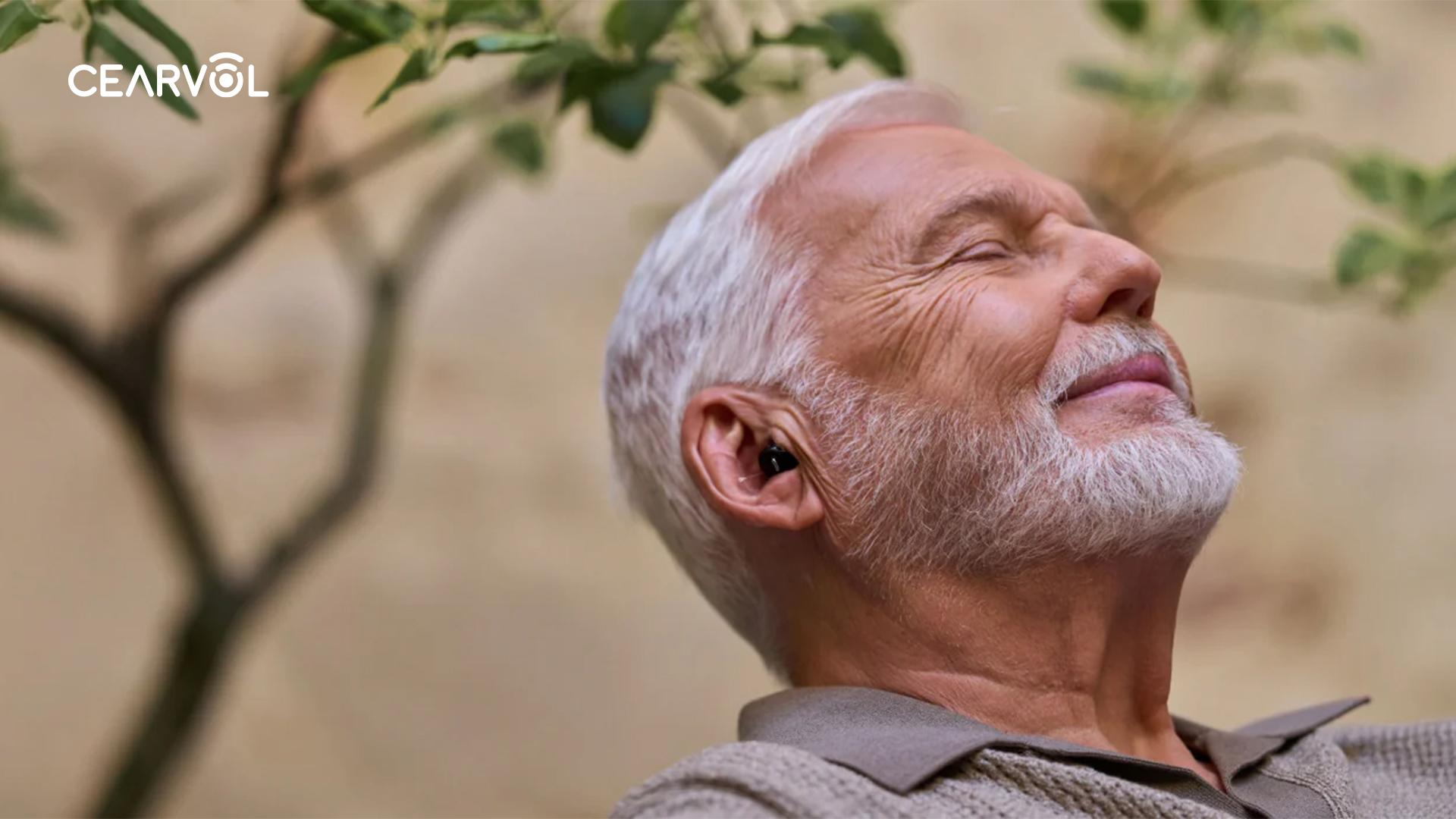 An elderly person using a Cearvol Nano product, demonstrating its user-friendly features