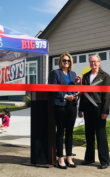 The Honorable Mayor Pro Tem of Frederick, Laura Brown and Karen Hamilton, Chief Operating Officer of YES Communities at the Prairie Greens Grand Opening  ribbon cutting ceremony and party.