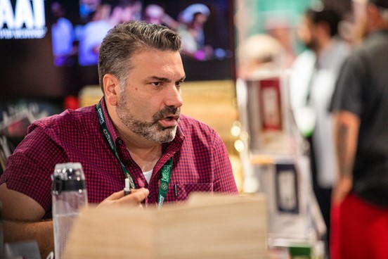 Over the past year, TAAT™ Chief Executive Officer Setti Coscarella has taken an interdisciplinary approach to developing, manufacturing, and commercializing TAAT™ as a better alternative to tobacco cigarettes for smokers aged 21+. Pictured above at the CHAMPS Las Vegas trade show in July 2021, Mr. Coscarella actively leads many initiatives for the Company as it seeks to continue capturing market share in the USD $814 billion global tobacco industry.