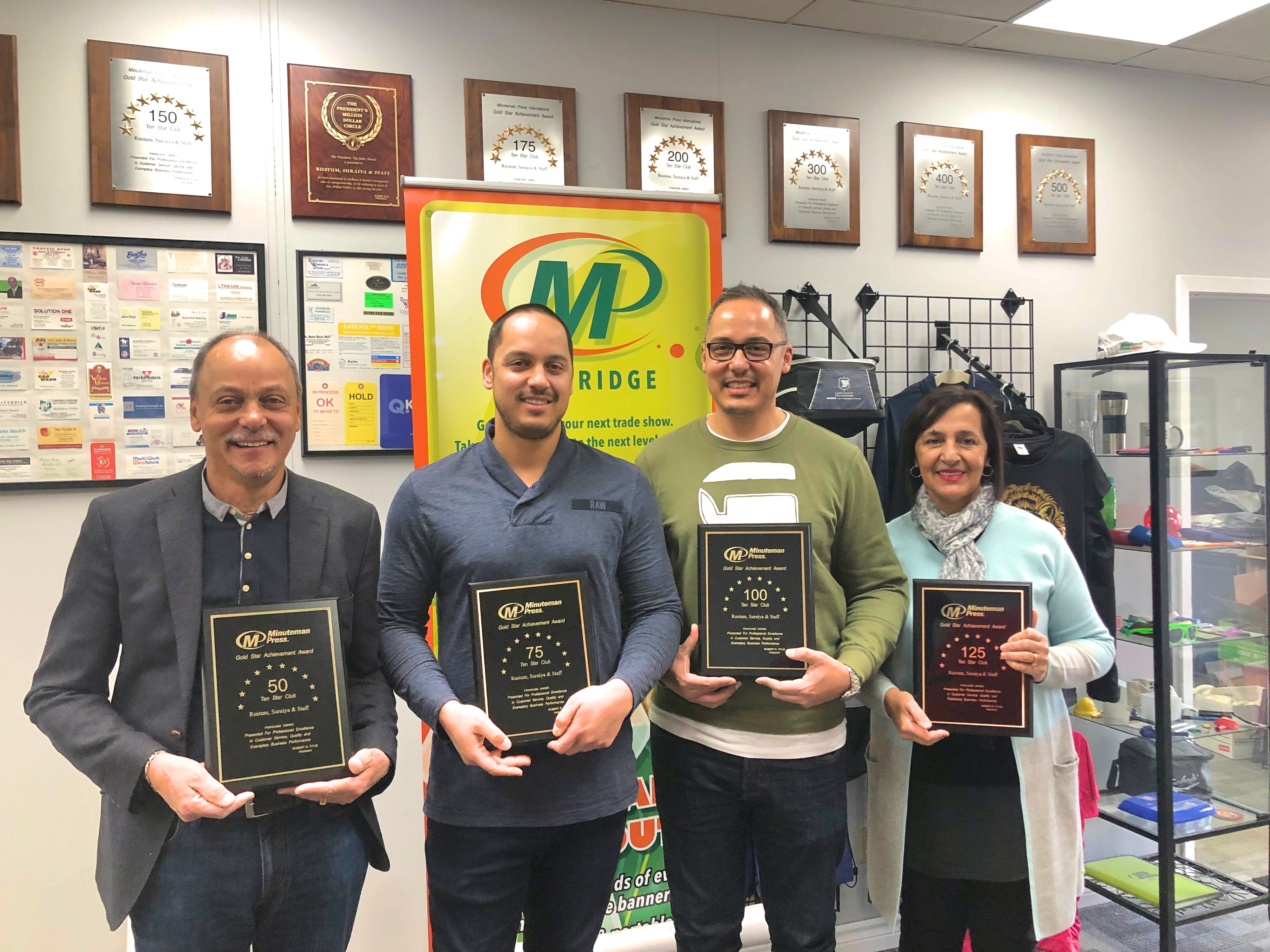 Minuteman Press franchise photo, Kitchener and Cambridge, Ontario, Canada – L-R: Rustum, Zayd, Mujeeb, and Suraiya. https://minutemanpressfranchise.ca