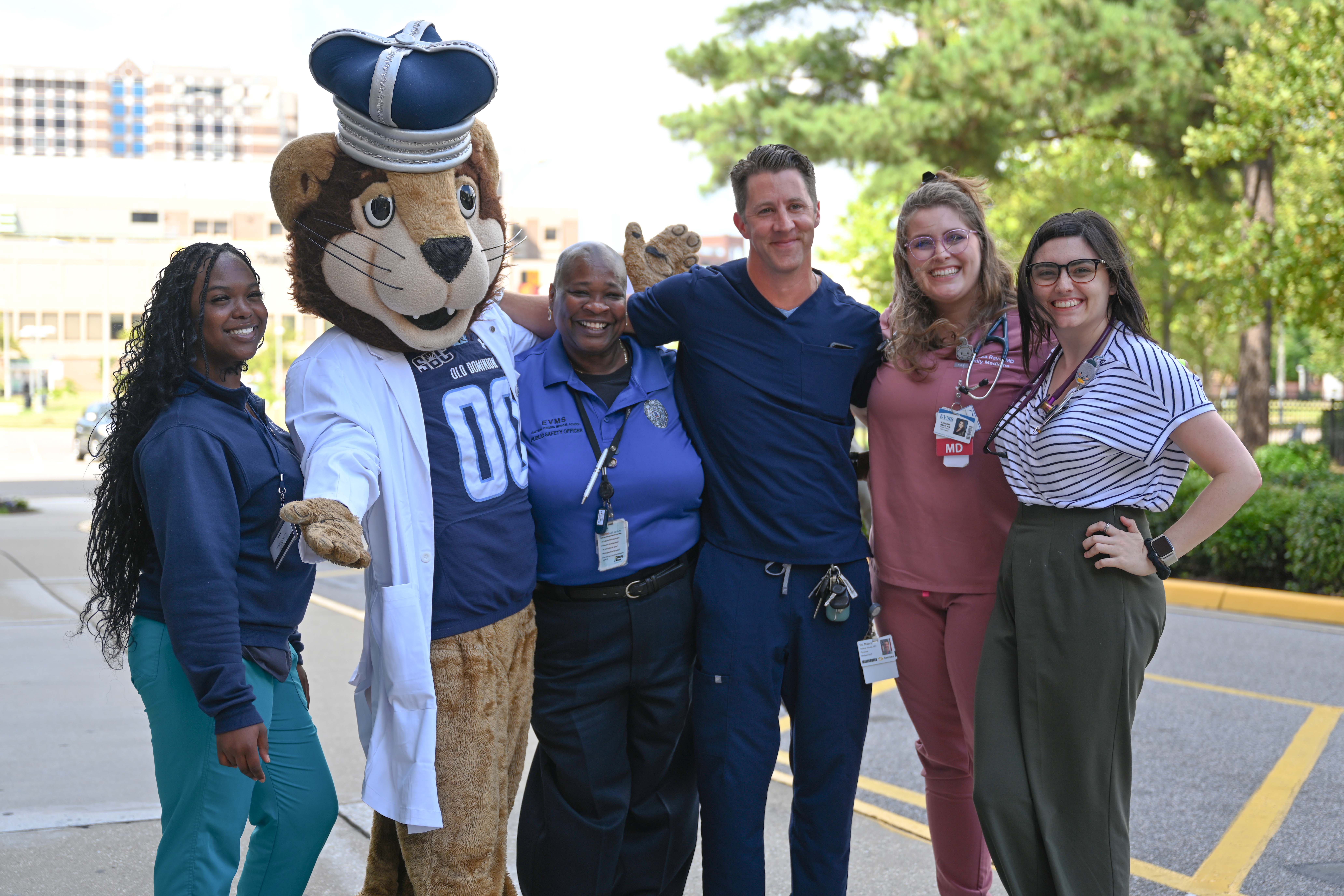 On July 1, Old Dominion University mascot Big Blue symbolically welcomed Eastern Virginia Medical School students, faculty and staff to ODU during a campus visit. Photo credit: Morganne Lander, ODU Communications