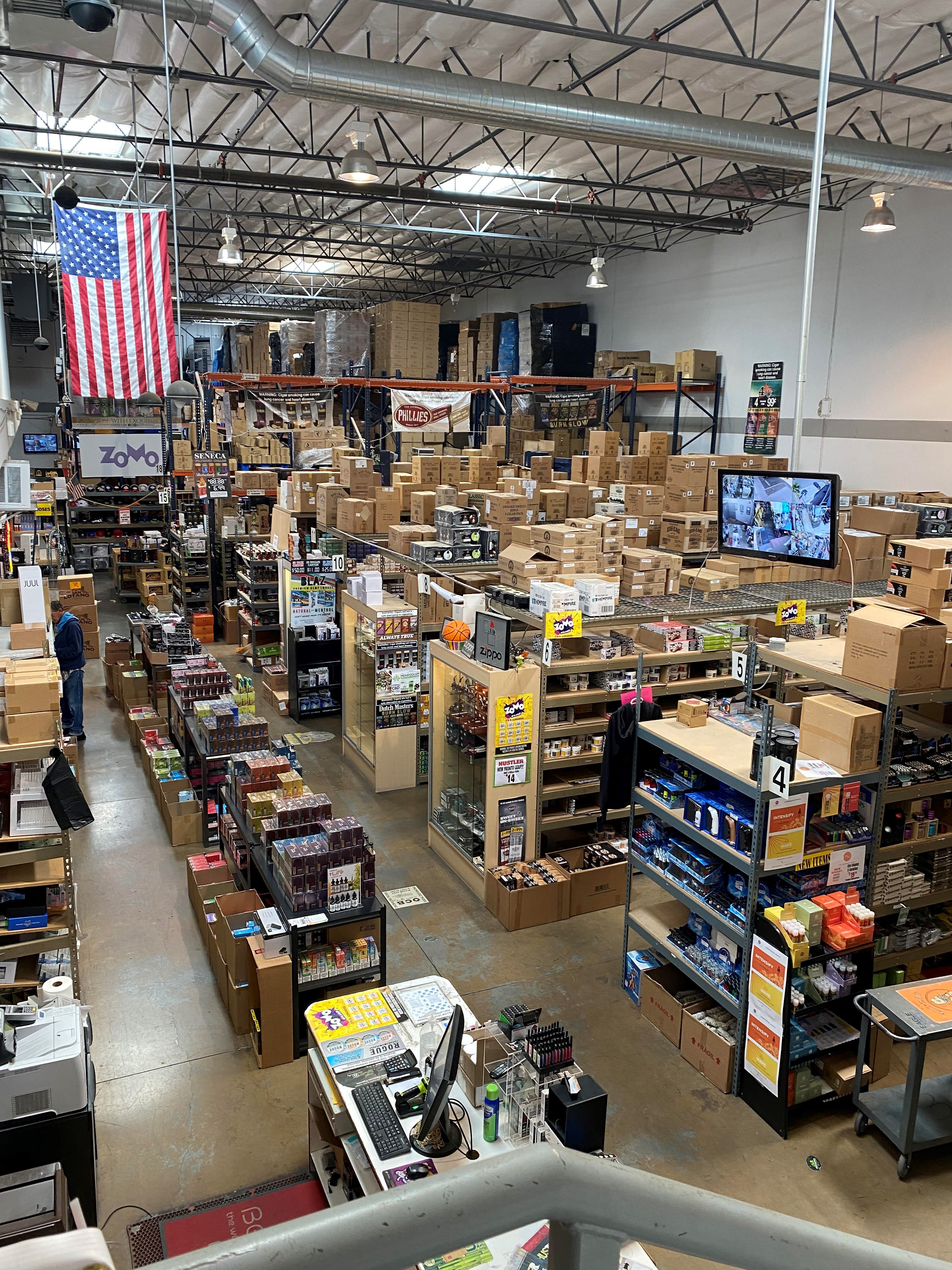 The two-story property is comprised of warehouse racking space, retail space, and office space located on the second floor, and sells over 2,000 different tobacco and tobacco-related accessory products. 