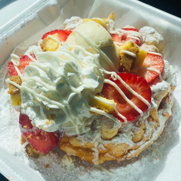 Guests to the Funnel Cake Queen in Decatur, Ala. can create a gourmet funnel cake topped with ice cream, fresh fruit, bits of candy or cereal, with syrup drizzled atop a cloud of whipped cream.