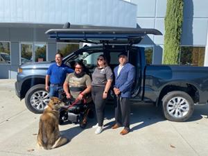 Jason Ross of Fallbrook, California, (second from left) was recently awarded a 2021 Chevy Silverado mobility-equipped vehicle as part of Wounded Warriors Family Support’s Mobility is Freedom program.