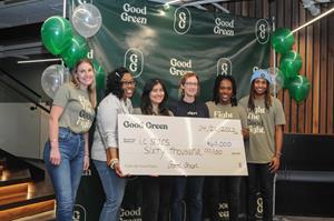 The Good Green team presents check to Good Green grant recipient i.c.stars.