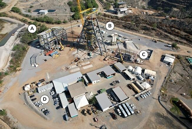 October 2023 aerial view of the Caraíba Operations shaft project, including (A) the permanent rock and personnel winders, (B) the completed shaft headframe, (C) the stage winder foundation, and (D) engineering and administrative buildings.