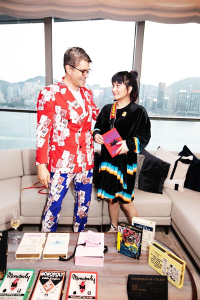 Josie with current brand founder Gregory Bernard showcasing the Josie and Olympia Le-Tan collaborative bag.
